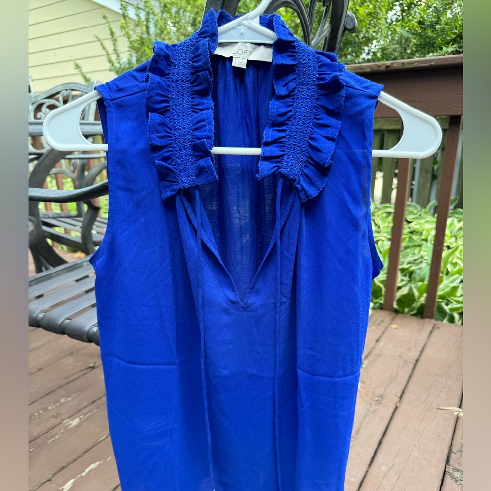 Reduce price! Never worn! Royal blue sleeveless blouse with ruffle collar